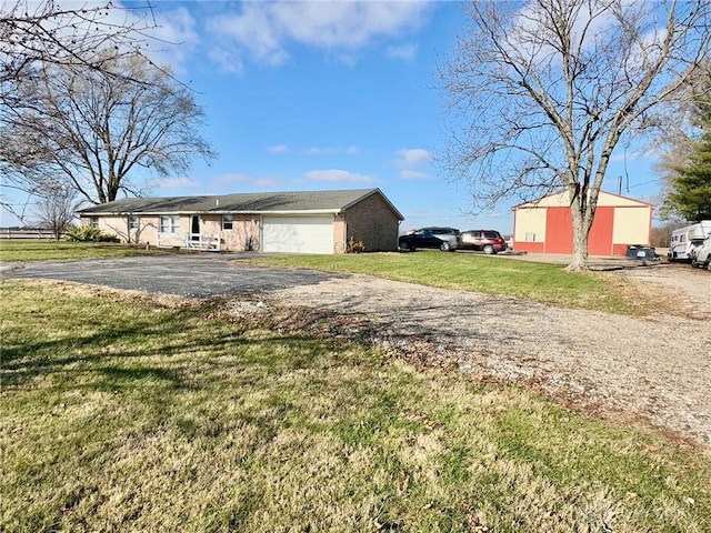 view of property exterior featuring a lawn and a garage