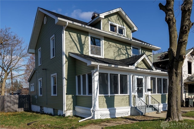 exterior space with a sunroom