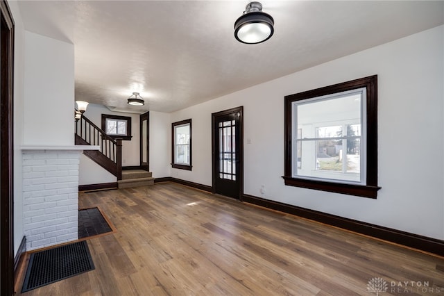 foyer entrance featuring hardwood / wood-style flooring