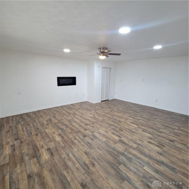 1246 Angiers Dr, Dayton, OH 45417 - spare room featuring ceiling fan, baseboards, dark wood finished floors, and recessed lighting