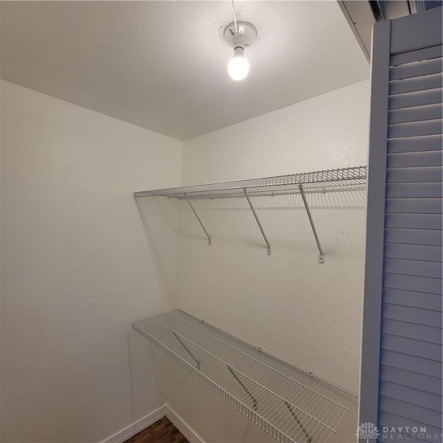 1246 Angiers Dr, Dayton, OH 45417 - walk in closet featuring wood finished floors