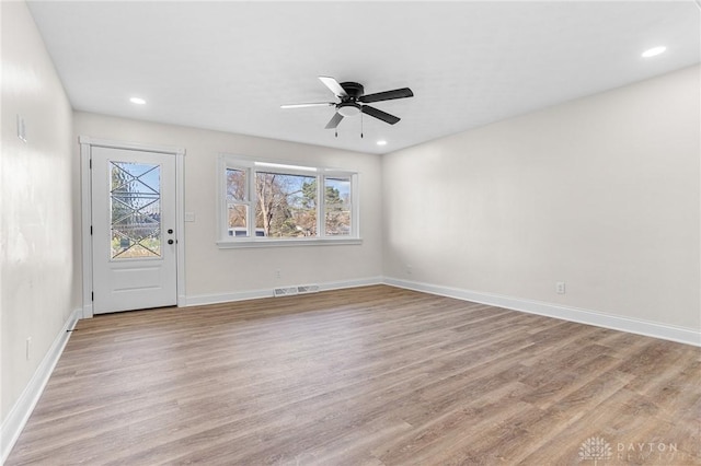 entrance foyer featuring ceiling fan and light wood-type flooring