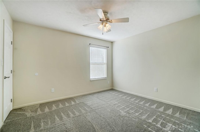 spare room with carpet flooring and ceiling fan