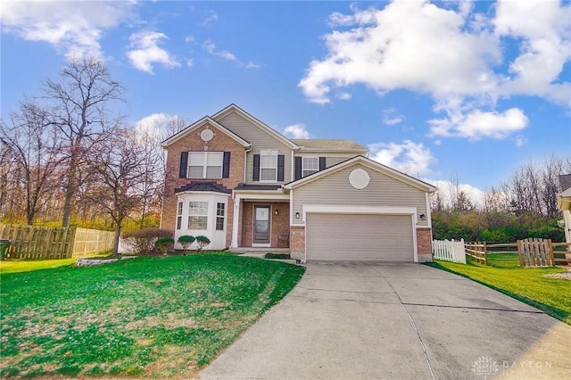 front of property featuring a garage and a front lawn