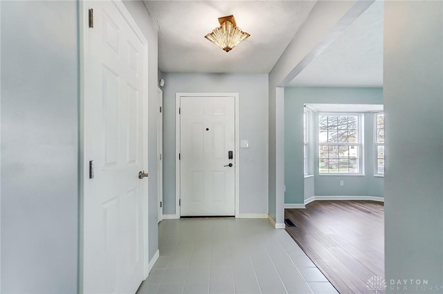 entrance foyer featuring light wood-type flooring