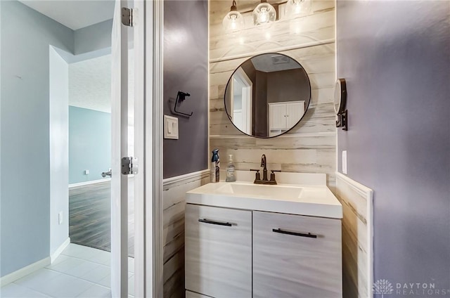 bathroom with vanity and tile patterned floors