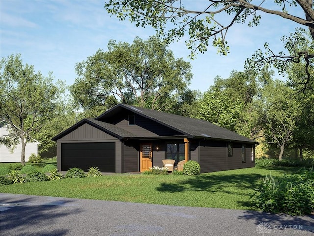 view of front facade featuring a garage and a front lawn