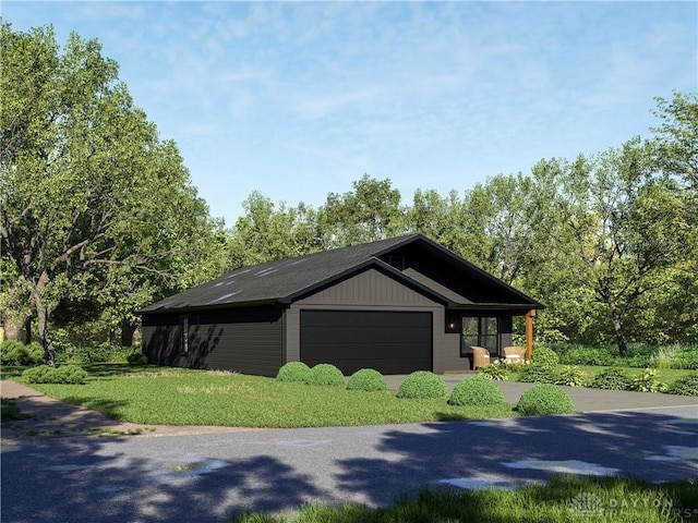 118 Arthur Ave, Carlisle, OH 45005 - view of home's exterior with a garage and driveway