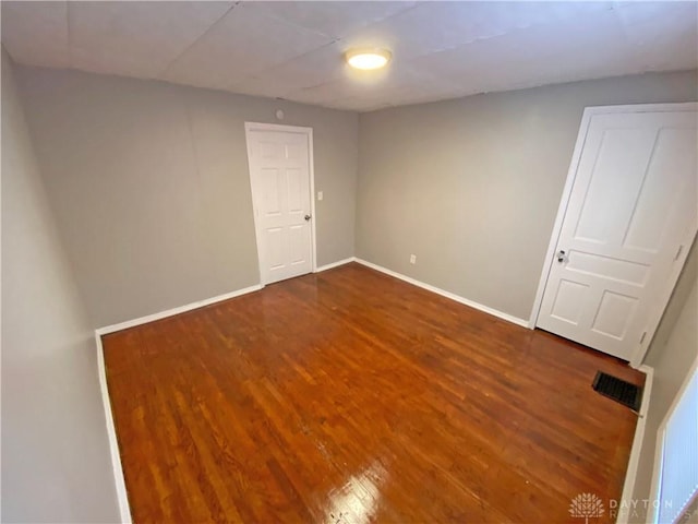 interior space featuring dark hardwood / wood-style flooring