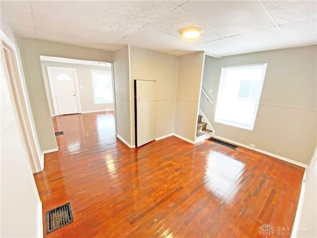 spare room with hardwood / wood-style flooring