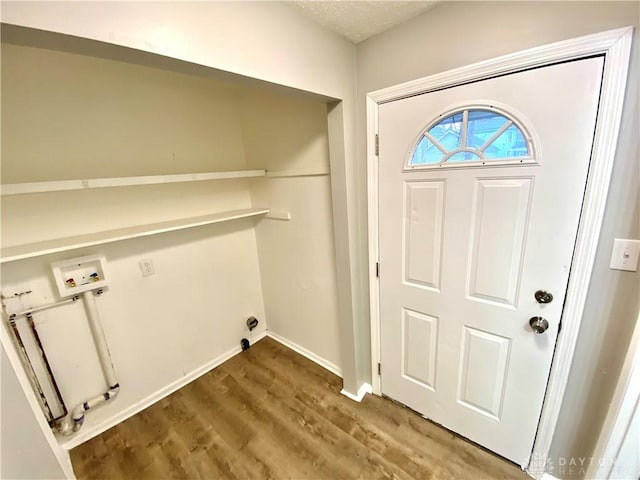 washroom featuring hardwood / wood-style floors and washer hookup