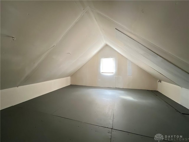 additional living space with lofted ceiling