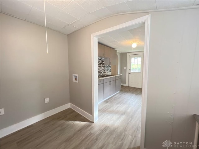 corridor with dark wood-type flooring