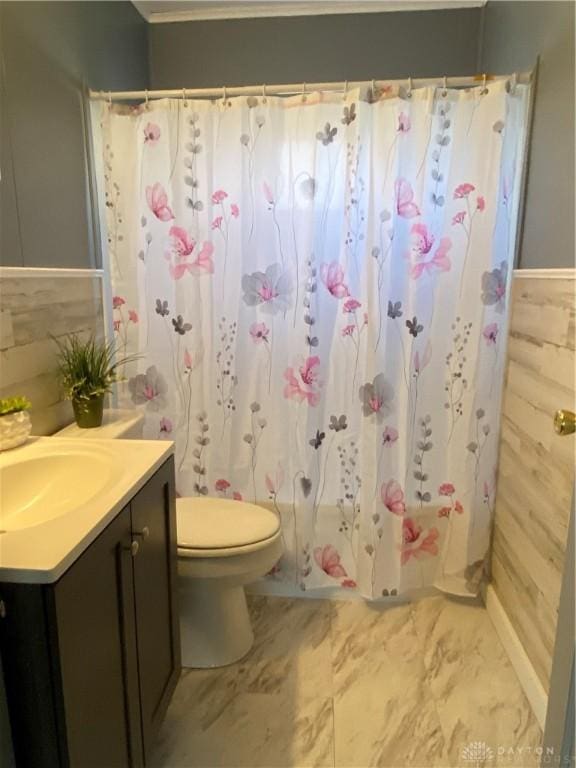 full bathroom with shower / tub combo, vanity, and toilet