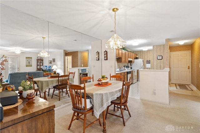 dining room featuring ceiling fan