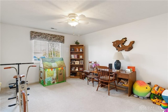 interior space featuring ceiling fan