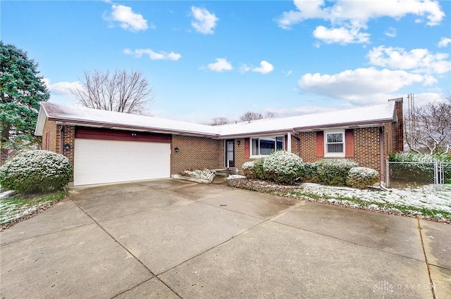 ranch-style home with a garage