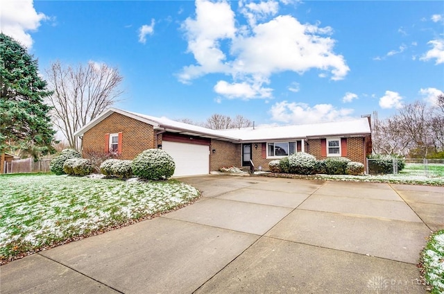 single story home featuring a garage