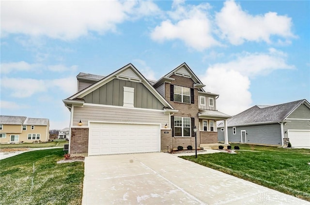 craftsman house featuring a front yard and a garage