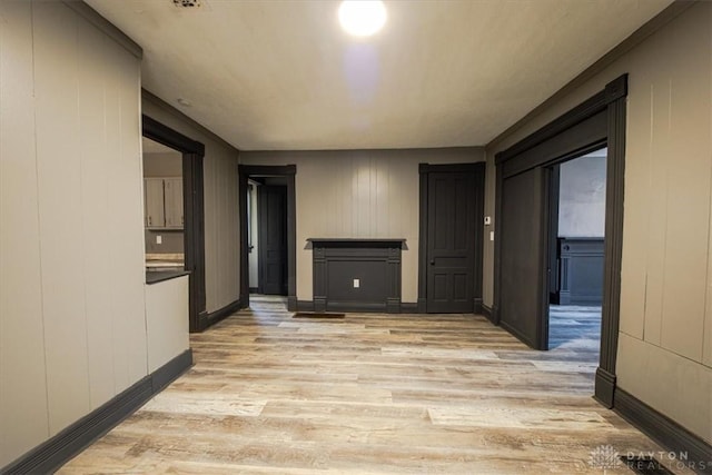 corridor featuring light wood-type flooring