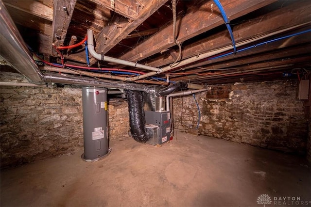 basement with electric water heater and heating unit