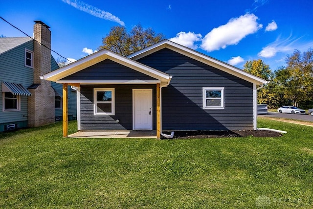 bungalow with a front yard