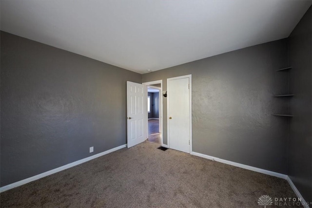 empty room with carpet floors