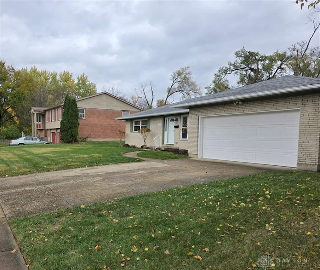 single story home featuring a garage and a front lawn