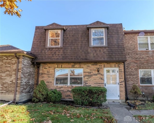 view of front of house with a front lawn