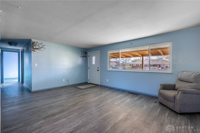 interior space with hardwood / wood-style floors