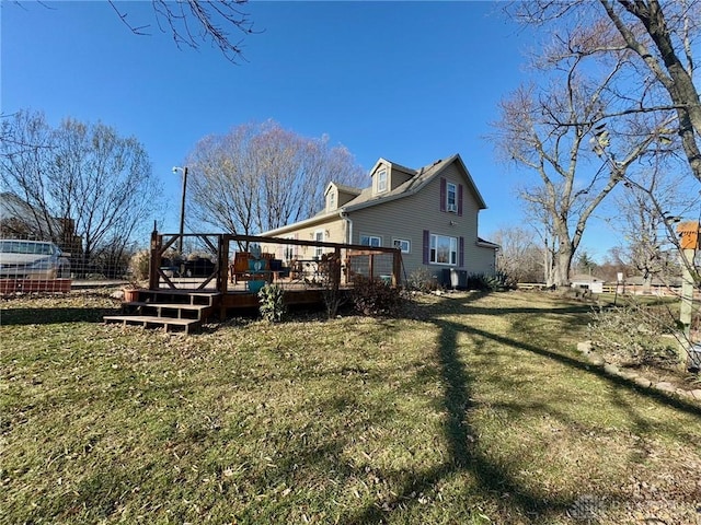 exterior space featuring a yard and a wooden deck