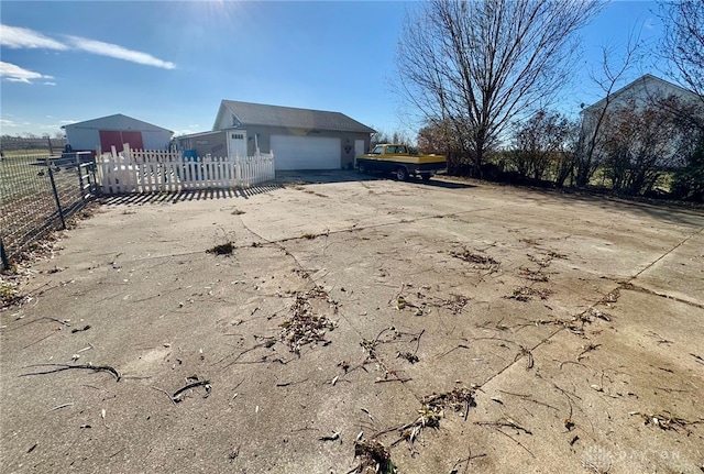 view of side of property featuring a garage