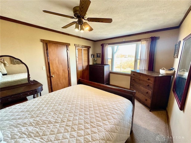 bedroom with ceiling fan, light colored carpet, a textured ceiling, and ornamental molding