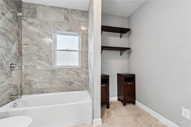 bathroom with tiled shower / bath combo