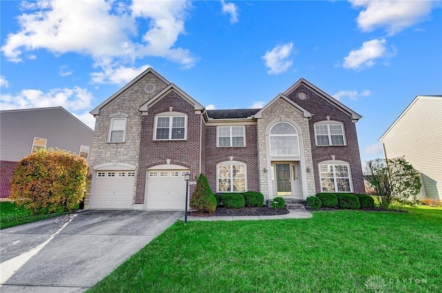 view of front of house with a garage and a front lawn