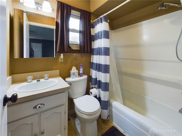 full bathroom featuring vanity, shower / bath combo, and toilet