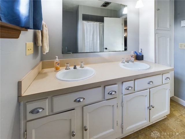 bathroom featuring vanity