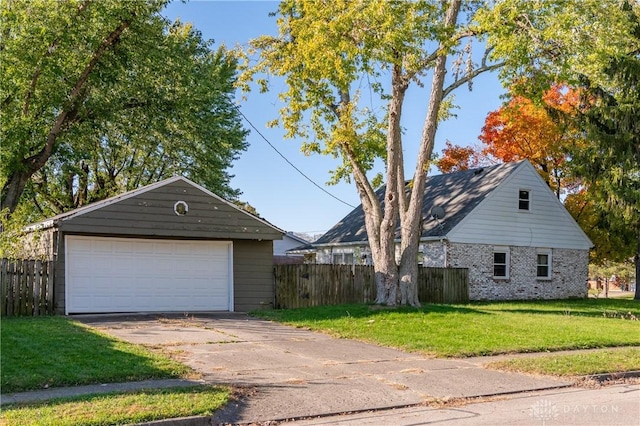 garage with a lawn