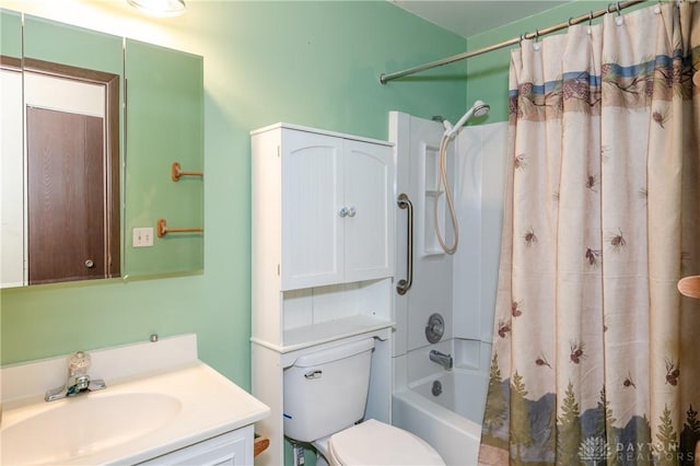 full bathroom featuring vanity, shower / bath combo, and toilet