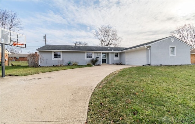 single story home with a garage and a front yard