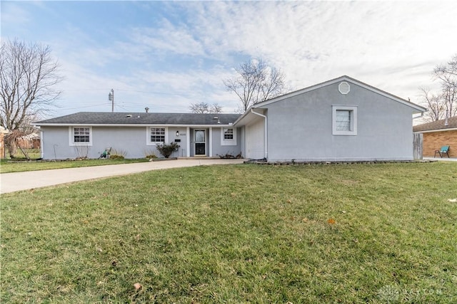 single story home with a front lawn