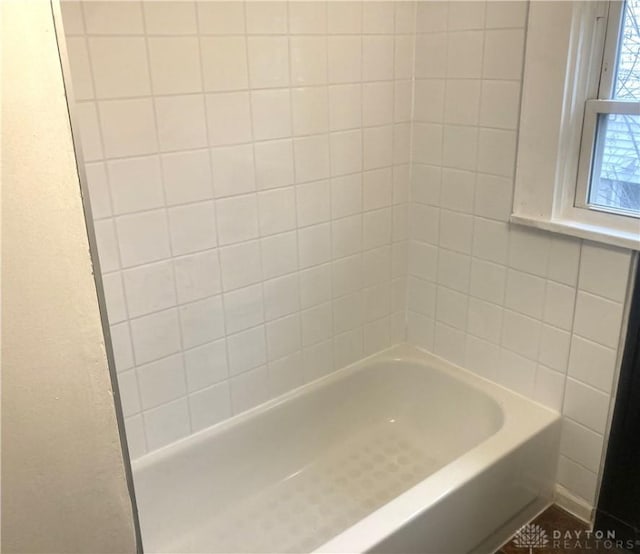 bathroom featuring bathtub / shower combination