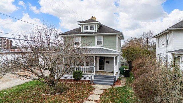 front of property featuring covered porch