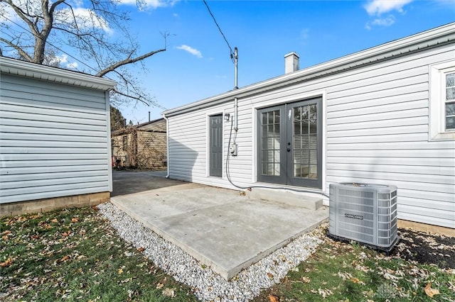 view of patio featuring central air condition unit and french doors