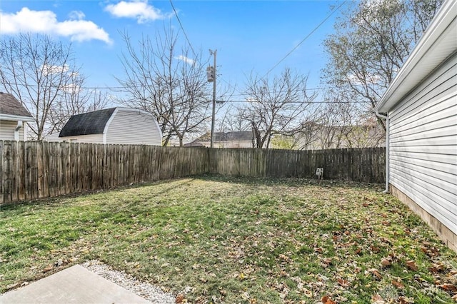 view of yard with a fenced backyard