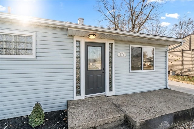 entrance to property with a patio