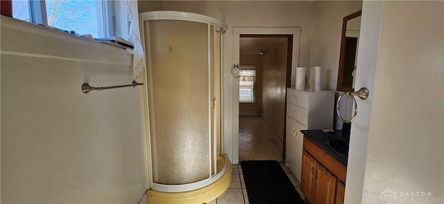 bathroom featuring tile patterned floors and vanity