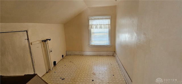 bonus room with vaulted ceiling