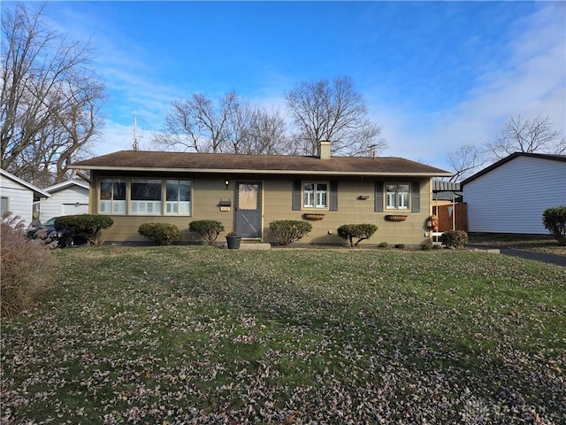 ranch-style home with a front yard