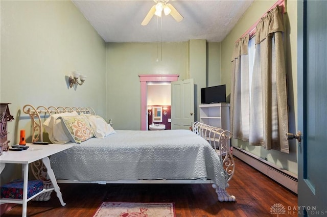 bedroom with a baseboard heating unit, dark wood-type flooring, and ceiling fan